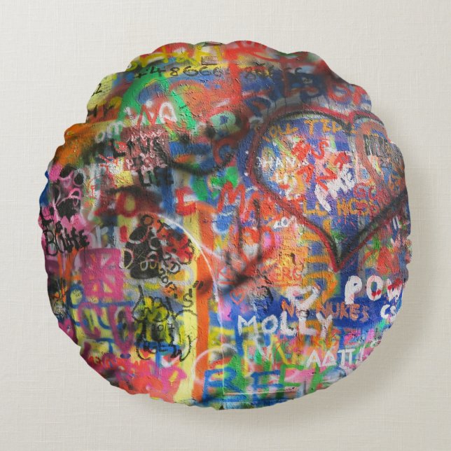 Multicolored graffiti on concrete wall round cushion (Front)