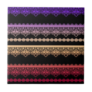 Multicolored lace on black ceramic tile
