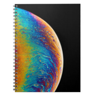 Multicolored planet fluid painting notebook