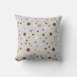 Multicolored polka dots on grey.  cushion