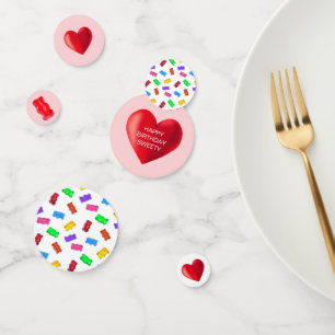 Multicolored sweets and hearts confetti