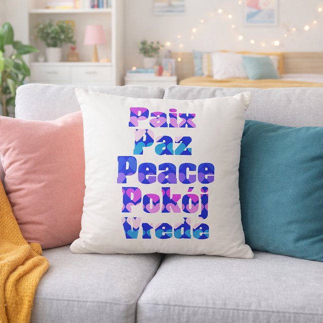 Multilingual Peace Typography with Pastel Hearts Cushion (A pillow with the words peace in French, Spanish, English, Polish and Swedish with hearts.)