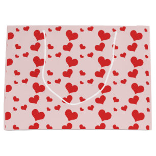 Multiple red hearts on a cute gift bag