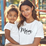 Mum Black Script Established Date Minimal Bold T-Shirt<br><div class="desc">Being a mum is one of the most important jobs in the world. Show your favourite mum that you care with this custom, minimal t-shirt. Simple black script calligraphy and black sans serif typography overlay a white tshirt. Personalise with the mum “established” year. And switch out “mum”, if desired, for...</div>
