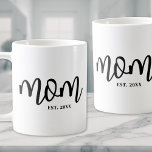 Mum Established Black Script Mother's Coffee Mug<br><div class="desc">Simple Script Mum Personalised Coffee Mug. Celebrate motherhood with this minimalist design featuring the word “mum” in a flowing handwritten script font centred on both sides of the mug. Below, a classic serif “est. year” adds a personal touch—perfect for a mum-to-be, a new mum, or to celebrate mum anytime. The...</div>