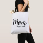 Mum Established Date Black Script New Mum Gift Tote Bag<br><div class="desc">Being a mum is one of the most important jobs in the world. Show your favourite mum that you care with this custom, minimal tote bag. Simple black script calligraphy and black sans serif typography overlay a white tote bag. Personalise with the mum “established” year date when your first child...</div>
