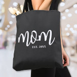 Mum Established New Mum Gift Tote Bag<br><div class="desc">Simple Script Mum Personalised Tote Bag. Celebrate motherhood with this minimalist design featuring the word “mum” in a flowing handwritten script font on both sides in white on a black tote bag. At the bottom right, a classic serif “est. year” adds a personal touch—perfect for a mum-to-be, a new mum,...</div>