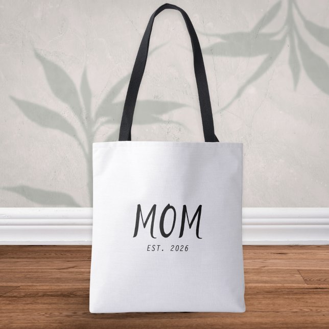 Mum Established New Mum Gift Tote Bag (A stylish tote bag with customizable "Mom Est. 2026" caption in black text on a white background)