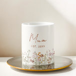 Mum Established Wildflower Terracotta Baby Shower Coffee Mug<br><div class="desc">Celebrate the beauty of motherhood with our "Mum Established Wildflower Terracotta Baby Shower Coffee Mug." Crafted with love and care, this terracotta-toned mug serves as a charming reminder of the precious journey ahead. The wildflower design symbolises the unique and blossoming bond between mother and child. "Mum Established" proudly displayed adds...</div>