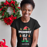 Mummy elf family matching christmas outfit name T-Shirt<br><div class="desc">Get into the holiday spirit with this fun Mummy elf t-shirt which is part of a matching family elf outfit collection containing gifts for any member of the family. Perfect for any Christmas family reunion, this t-shirt features a cute elf hat and fun legs, with the caption "Mummy elf" in...</div>