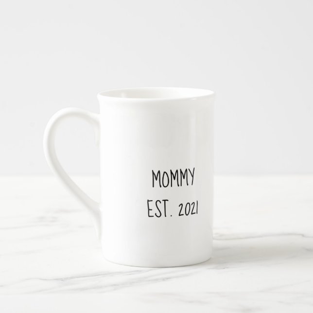 Mummy 'est year' mug for new parents (Left)