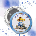 Mummy to Be of a Lil' Cowboy | Baby Shower 6 Cm Round Badge<br><div class="desc">Oh,  boy,  it's a Lil' Cowboy! Blue and brown baby Mum to be buttons featuring a little baby boy in a cowboy hat sitting with a teddy bear,  train and baby chick. Country and western themed rustic boy's baby shower.</div>