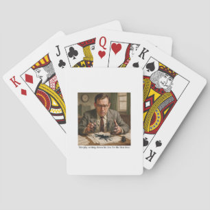 Murphy writing down his law for the first time. playing cards