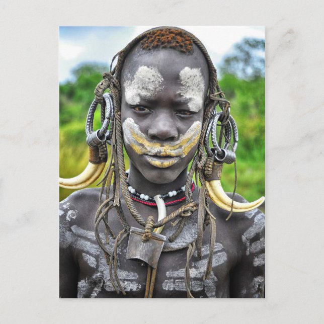 Mursi boy with painted body and tusk headdress postcard (Front)