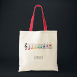 Music Lesson Rainbow Notes Children Tote Bag<br><div class="desc">This cute and fun musical custom name tote bag features a stave with rainbow music notes. It is perfect for your child to carry their music to piano, violin, or flute lessons. Customise it with your own details, and use the editing tool to make further adjustments such as font size...</div>