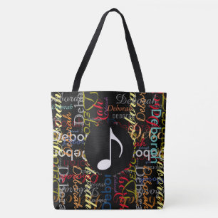 music note with a pattern of colourful names on bl tote bag