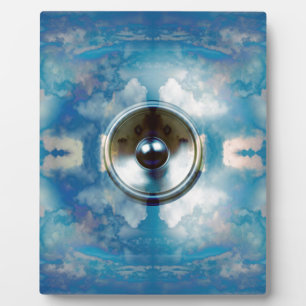 Music speaker and cloudy blue sky plaque