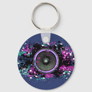 Music speaker and splattered paint key ring