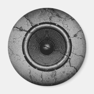 Music speaker on a cracked wall magnet