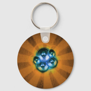 Music speakers and orange sunburst key ring