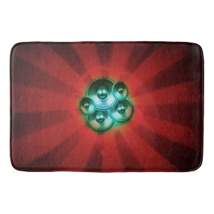Music speakers and red sunburst bath mat