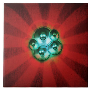 Music speakers and red sunburst ceramic tile