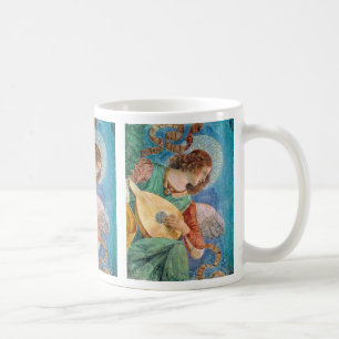 Musical angel playing guitar coffee mug
