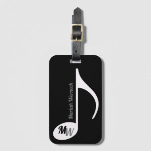 musical note on black bag tag with name