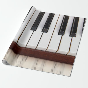 musical notes on the background of a pianoacoustic wrapping paper