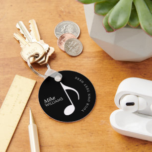musical symbol on black keychain with name