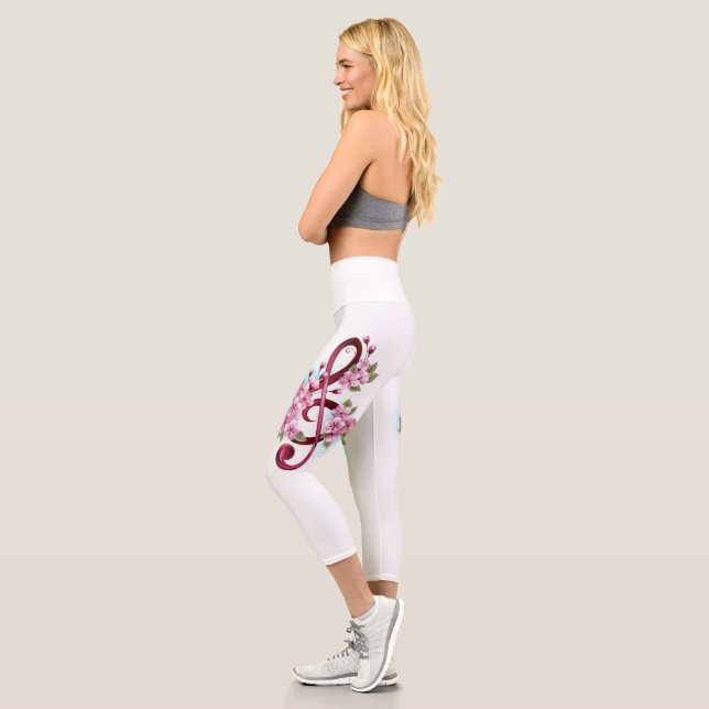 Musical treble clef notes with Sakura flowers Capri Leggings (Left)