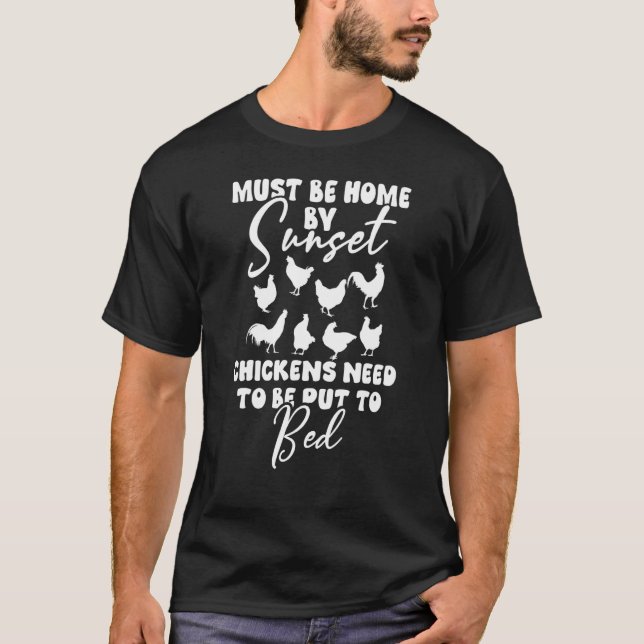 Must be home by sunset Chickens need to be put to  T-Shirt (Front)