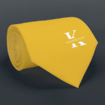 Mustard Yellow Elegant Monogram   Name | Two-Sided Tie<br><div class="desc">An elegant necktie featuring a bold white monogram across a deep Mustard Yellow background. On top of this monogram sits your first or last name spelled out in all capitals. If you prefer a bolder look for the personal name inside of the large letter you can do the following: Use...</div>