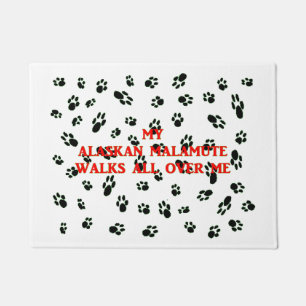 my alaskan malamute walks on me doormat