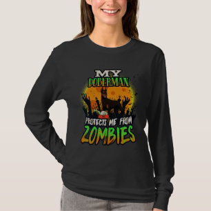 My Doberman Protects Me From Zombies Funny Doberma T-Shirt