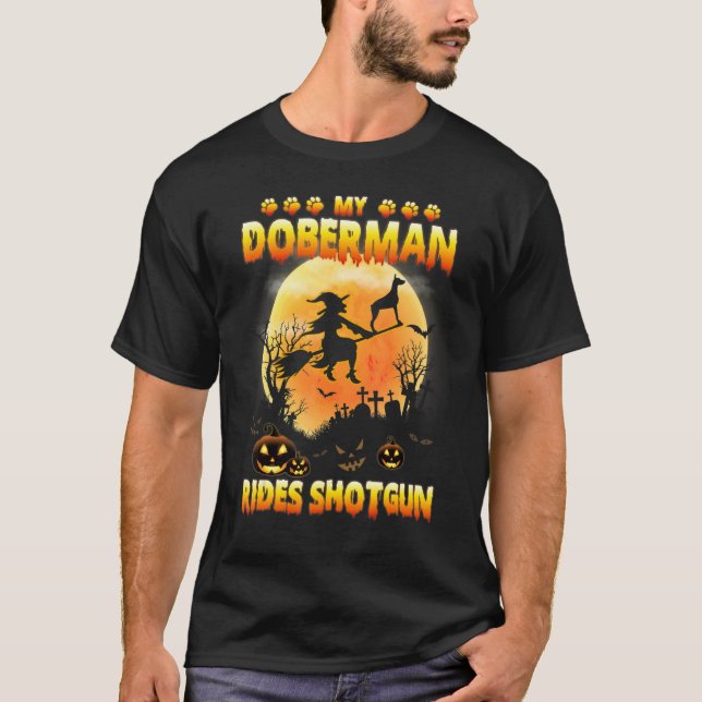 My Doberman Rides Shotgun Witch Fly Broomstick Hal T-Shirt (Front)
