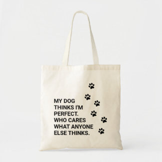 My dog thinks I'm perfect. Who cares what... Tote Bag