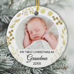My First Christmas As Grandma Photo Gold Foliage Ceramic Ornament<br><div class="desc">This elegant Grandma Christmas Ornament is decorated with gold foliage on a white background.
Easily customisable with baby's photo and year.
Original Watercolor © Michele Davies.</div>