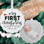 My first Christmas with name photo Tree Decoration Card<br><div class="desc">Lovely first Christmas ornament decorated with a red Santa hat,  holly leaves,  and colourful Christmas lights. Easily customisable with the baby's name and current year and one of your favourite pictures on the reverse.</div>