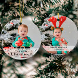 My first Christmas with name two photos Ceramic Ornament<br><div class="desc">Celebrate your newborn baby's first Christmas with this lovely first Christmas photo ornament and customize it by adding one of your favorite pictures on the front, with a cute overlay typography that reads "My first Christmas" decorated with tiny snowflakes. Add a second picture on the reverse of the ornament, and...</div>