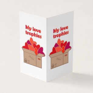 My love trophies in box full of Valentines hearts