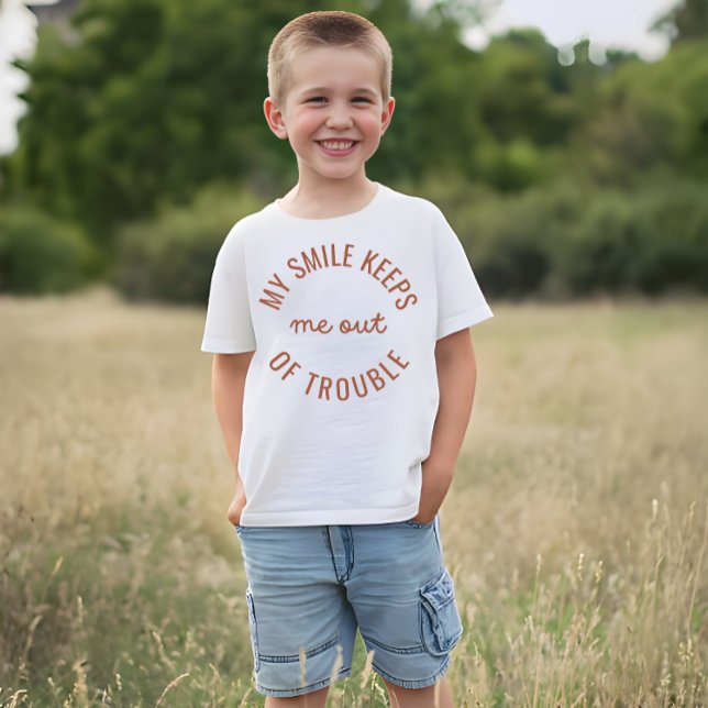 My smile keeps me out of trouble  T-Shirt (Creator Uploaded)