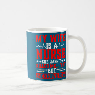 My wife nurse, she hasn't killed me... Artwork Coffee Mug