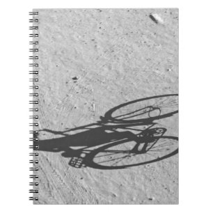 Myamar, Bagan, Young boy riding a huge bike and Notebook