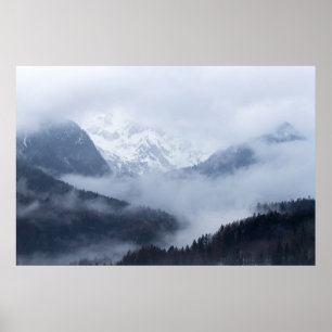 Mysterious fog rolling through layers of mountains poster