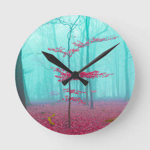Mystical forest in red and turquoise round clock