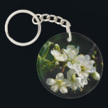 Mystique Dark Botanical Plum Blossom Keyring<br><div class="desc">This elegant double-sided accessory features my original macro photography of delicate white plum blossoms, captured in the moody and sophisticated "Dark Botany" style. The front side showcases the intricate details of the small, fragrant petals and their vibrant yellow stamens against a deep, atmospheric background. The reverse side offers a minimalist...</div>