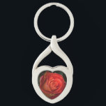 Mystique Dark Botanical Red Orange Rose Keyring<br><div class="desc">Carry a piece of nature’s hidden beauty with this premium metal accessory. This original, high-definition macro photograph captures a vibrant red and orange rose adorned with crystalline dewdrops against a moody, deep background. Every detail has been carefully preserved to ensure exceptional depth and gallery-quality clarity. The elegant "Mystique" text is...</div>