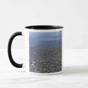 NA, USA, Montana, Glacier NP Rocks in Lake Mug