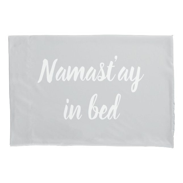Namastay in bed brush script lettering light grey pillowcase (Front)